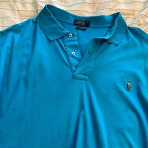 Blue polo Ralph Lauren. Men’s 2 XL. Does not fit anymore. Good condition.